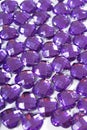 Purple Rhinestone background. Heart shape texture as backdrop isolated white studio photo. Bling rhinestone crystal