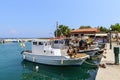 Small sea port with moored fishing boats on Rhodes island, Greece Royalty Free Stock Photo