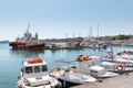 Traditional Greek boats are moored in port of Rhodes town on Rhodes island. Royalty Free Stock Photo