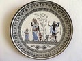 Rhodes, Greece - July 23, 2018: Plate with the image of the goddesses of Greek mythology Athena and Aphrodite. Close-up