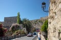 RHODES, Greece Ã¢â¬â JUN 07, 2021. View of the ancient medieval walls of the Rhodes Town near the Hippocrates Square and Mandraki