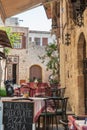 Rhodes, Greece. 05/30/2018. Local restaurant on main Sokratous street. Rhodes, Old Town, Island of Rhodes, Europe Royalty Free Stock Photo