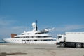 Rhodes, Greece. May 30, 2018. Akti Sachtouri, sea promenade in old port. Luxury yacht mooring while receiving supplies. Island of