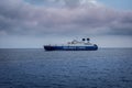 Rhodes, Greece - May 28, 2023: Salamis Lines blue cargo ship in the sea.