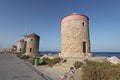 Rhodes Mandraki harbour wind mills. Greece