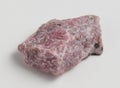 Ore rhodonite on white background.