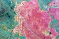 Rhodonite pink massive. Close-up of manganese inosilicate marble like surface Royalty Free Stock Photo