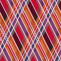 Rhombic tartan fabric seamless texture in warm hues