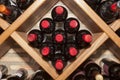 Rhomboid wine rack with multiple bottles of spanish red wine