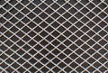 Rhombus metal pattern on black surface