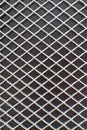 Rhombus metal pattern on black surface