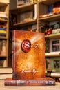 Rhonda Byrne\'s The Secret book in the bookshop. Self-help book.