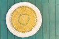 Rhubarb Apple Vanilla Cake on White Plate Turquoise Background