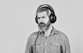 Rhythm concept. Noise cancellation function. Professional gadget. Music beat. Man bearded hipster headphones listening