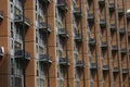 A rhythm of the rows of balconies of a modern building 1 Royalty Free Stock Photo