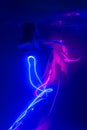 Rhythmic gymnast dancing underwater with neon ribbons. Free diving. Soft focus. Artistic Royalty Free Stock Photo