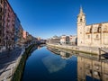 Ria de Bilbao with the church of San Anton, in the seven streets, old town, in the Basque country Royalty Free Stock Photo