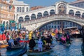 Rialto bridge Carnival masks venice historic city with its canals Royalty Free Stock Photo