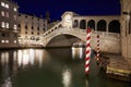 Rialto Bridge and Grand Canal with people and tourists at night in Venice, Italy Royalty Free Stock Photo