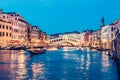 Rialto bridge and Grand Canal in Venice, Italy at night. Royalty Free Stock Photo