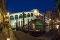 Rialto bridge by night with people Royalty Free Stock Photo