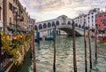 Rialto bridge over Grand canal at sunrise, Venice, Italy Royalty Free Stock Photo