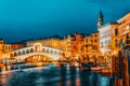 Rialto Bridge Ponte di Rialto or Bridge of Sighs and view of the most beautiful canal of Venice - Grand Canal and boats, Royalty Free Stock Photo