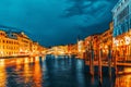 Rialto Bridge Ponte di Rialto or Bridge of Sighs and view of the most beautiful canal of Venice - Grand Canal and boats, Royalty Free Stock Photo