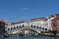 Rialto bridge under blue sky in Venice Royalty Free Stock Photo