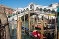 View of the landmark Ponte di Rialto bridge over the Grand Canal in Venice, Italy. Royalty Free Stock Photo