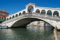 View of the landmark Ponte di Rialto bridge over the Grand Canal in Venice, Italy. Royalty Free Stock Photo