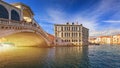 Rialto bridge in Venice, Italy. Venice Grand Canal. Architecture and landmarks of Venice. Venice postcard with Venice gondolas Royalty Free Stock Photo