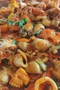 Riau Archipelago's special seafood, stir-fried Gonggong Snails with sauce. Royalty Free Stock Photo