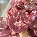 Rib-eye. Meat that has been cut into perfectly sized pieces in a circle shape. Suitable for steak.