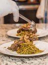 Plated Rib Eye Steak, Green Beans, Baby Potatoes, and Sauteed Shrimp Royalty Free Stock Photo