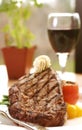Rib Eye Steak served with wine Royalty Free Stock Photo