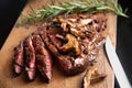 Rib eye steak sliced on a cutting board Royalty Free Stock Photo