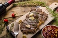 Rib eye steak with wine