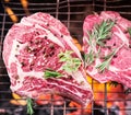 Rib eye steaks and grill. Royalty Free Stock Photo