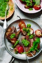 RIB-EYE STEAKS WITH RADISH GREENS CHIMICHURRI SAUCE.style rustic. Royalty Free Stock Photo