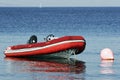 RIB, rigid inflatable boat moored at buoy Royalty Free Stock Photo