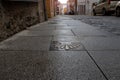 RIBADEO, SPAIN - October 4, 2020: Scallop shell St Jakob`s route sign on the stone pavement in the Ribadeo, Lugo, Galicia, Spain