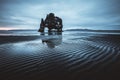 Ribbed dark sand after the tide. Location place Hvitserkur, Iceland, Europe