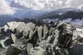 Ribbed slate on top of a mountain range.View from the way to Grossglockner rock summit, Kals am Grossglockner, Austria Royalty Free Stock Photo