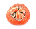 Ribbed and warty orange turban squash with striped, lobed centre