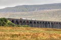 Ribblehead Viaduct with train crossing