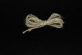Ribbon from brown rope isolated on black background surface Royalty Free Stock Photo