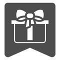 Ribbon with gift box solid icon, black friday concept. Vector graphics. Sticker with present package sign on white Royalty Free Stock Photo