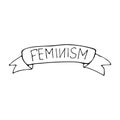 Ribbon with the inscription feminism