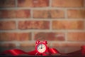 Ribbon and little alarm clock Royalty Free Stock Photo